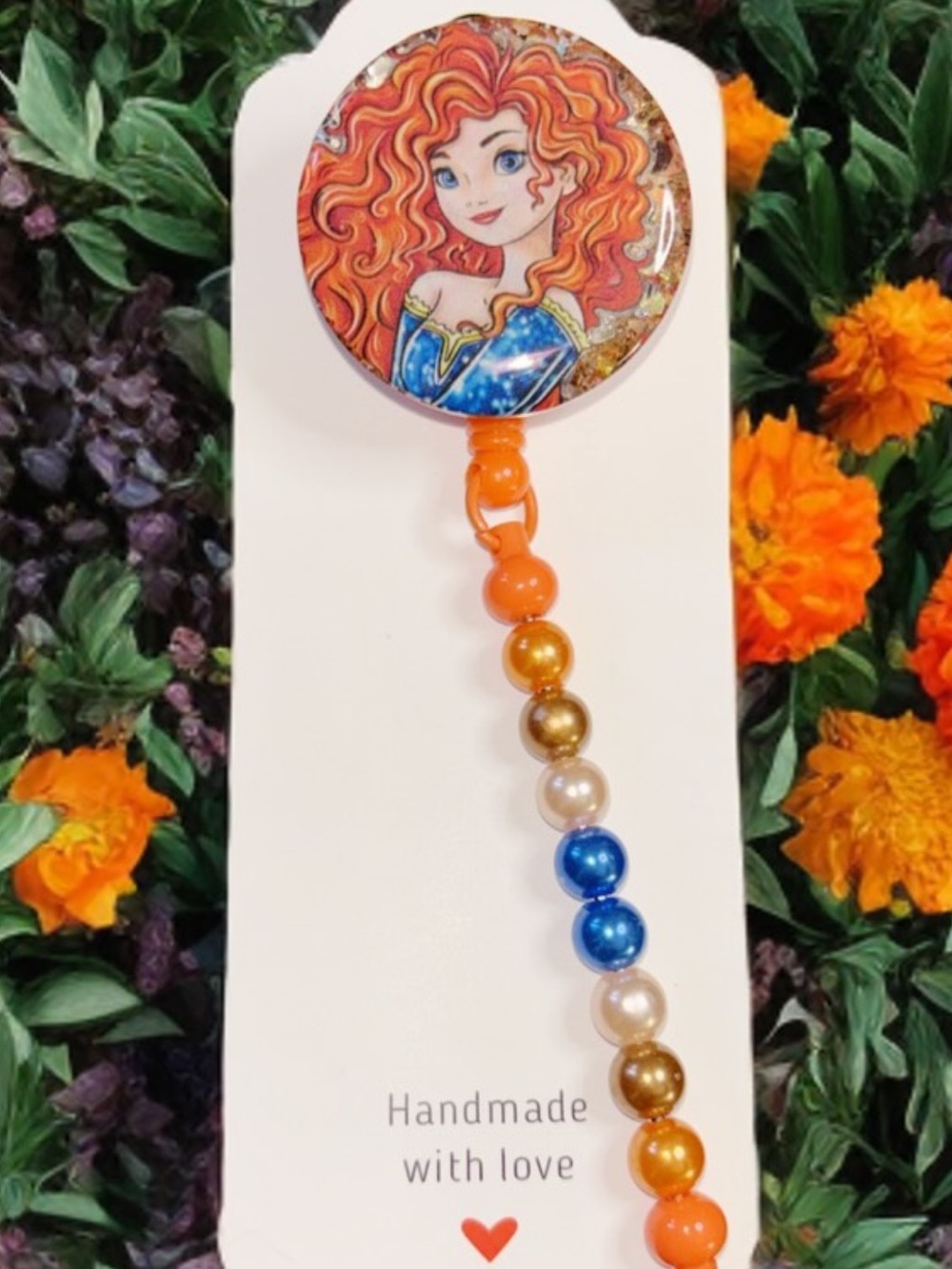Merida Beaded Badge Reel in Orange & Blue
